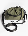 TPS organizer drawstring bag with black straps on a white background